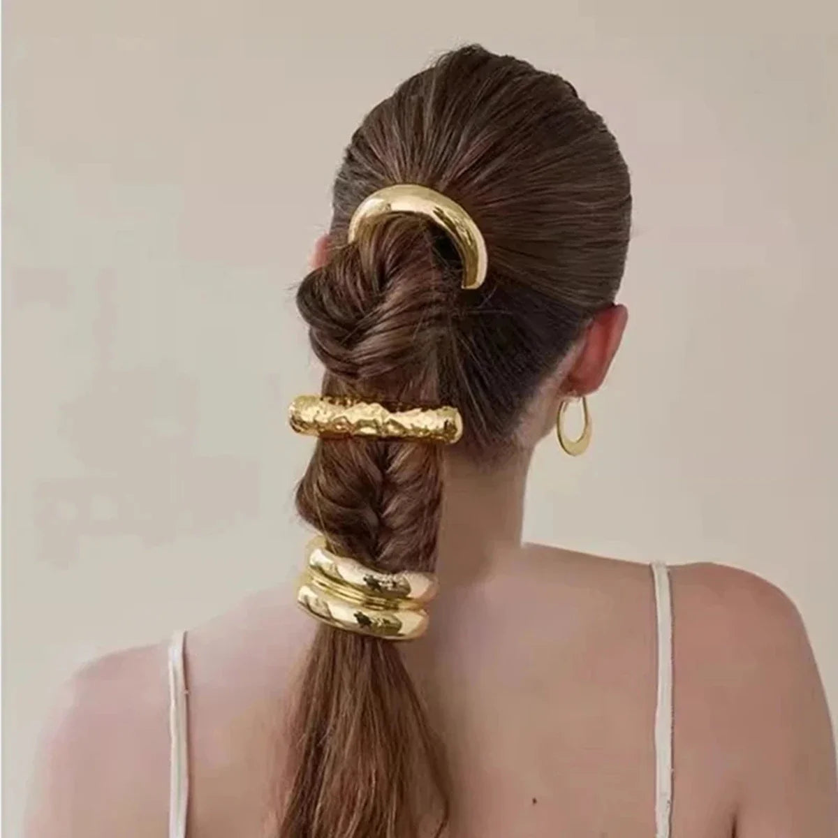 Die vergoldete Touch-Haarspange