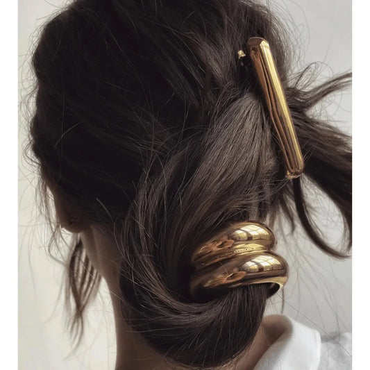 Die goldene Haarspange